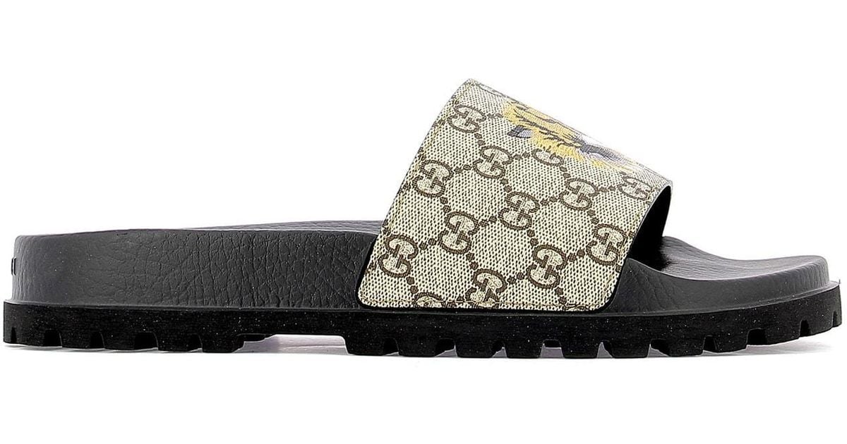gucci tiger print slides