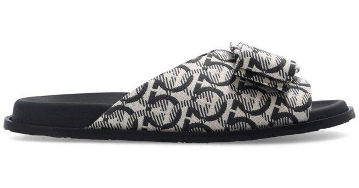 Ferragamo Viva Bow Monogram Slides in Black Lyst