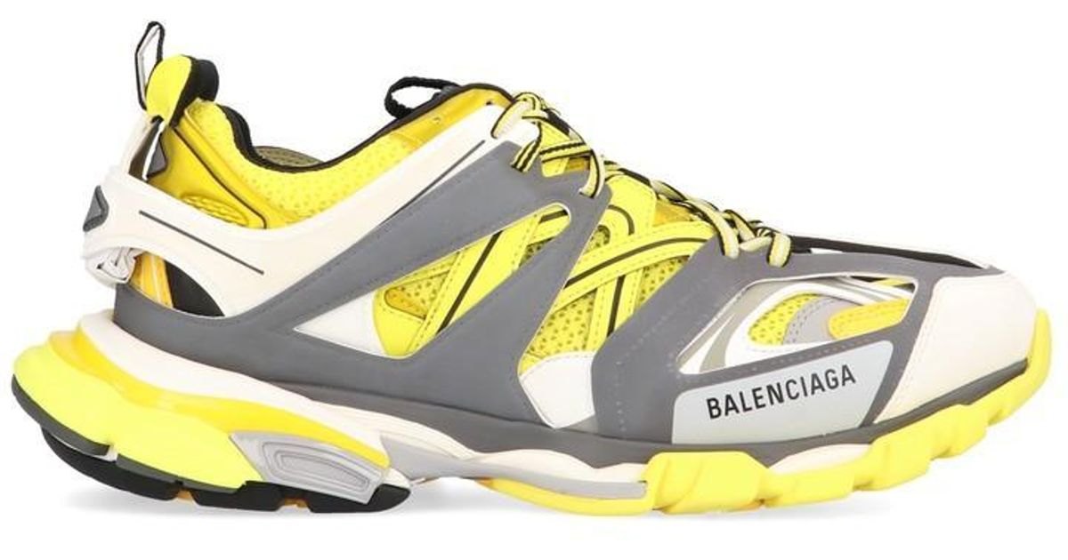 yellow track shoes