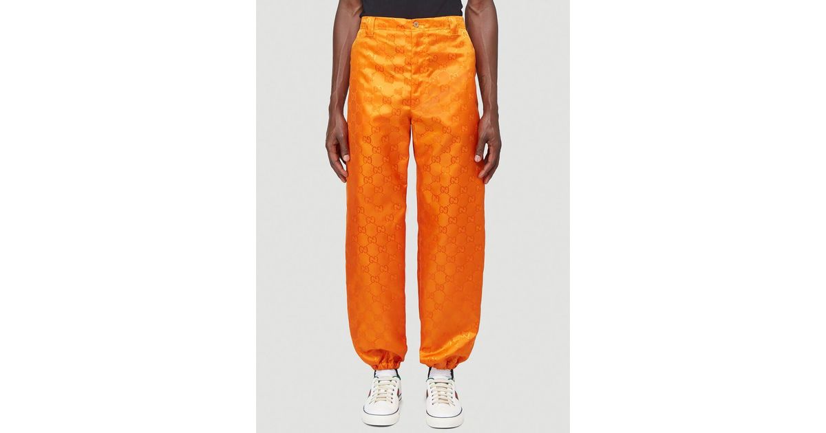 orange gucci sweatpants