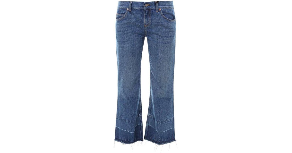 Gucci X Disney Donald Duck Cropped Flared Jeans in Blue | Lyst Canada