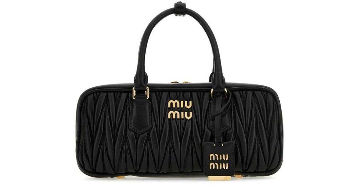 Miu Miu Matelassé Zipped Crossbody Bag in Black | Lyst