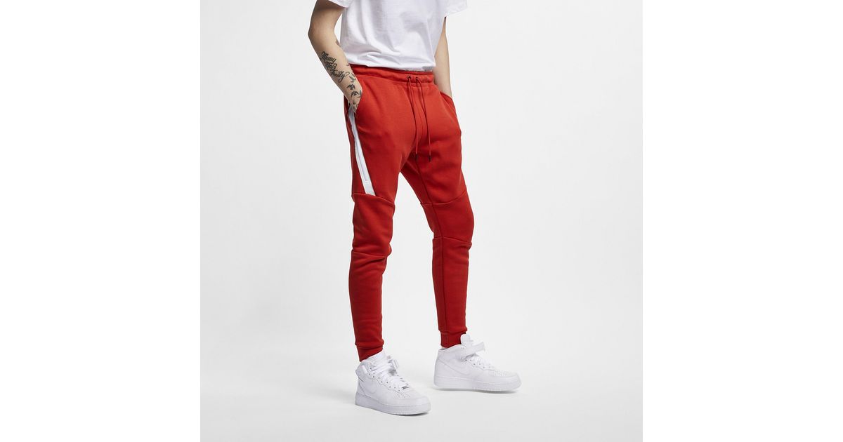red and white nike tech