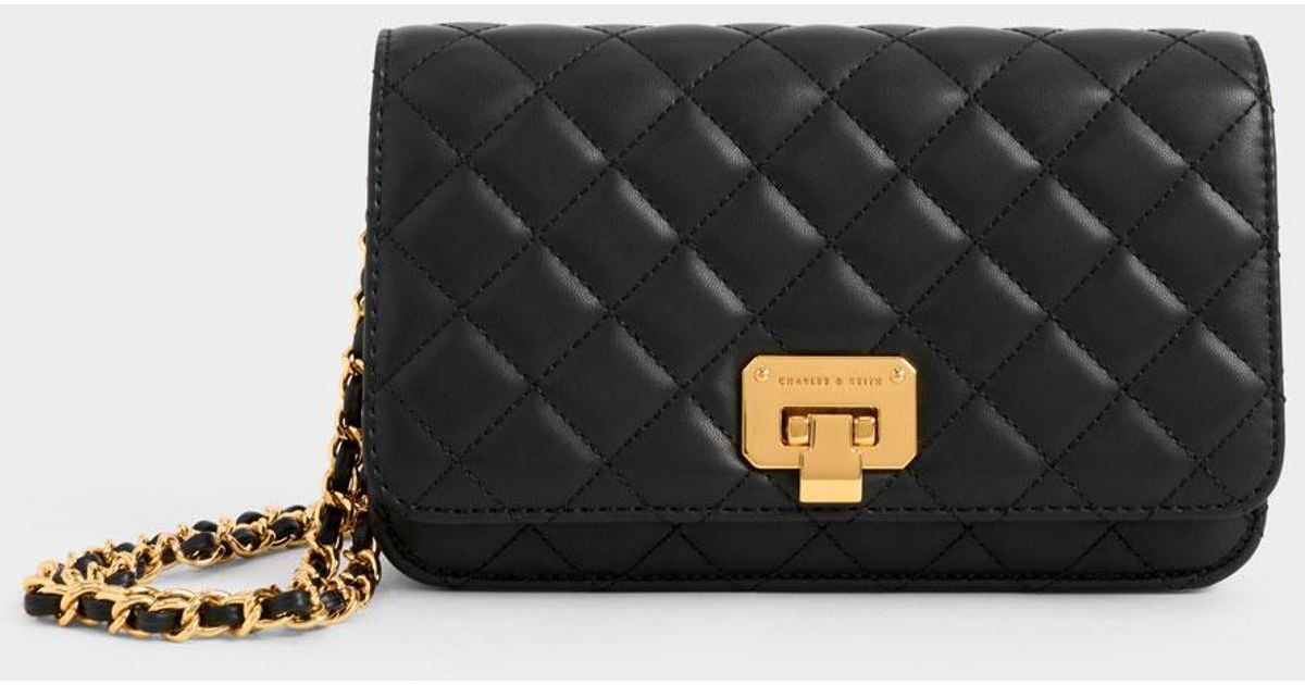 Charles & Keith Quilted Pushlock Clutch in Black Lyst