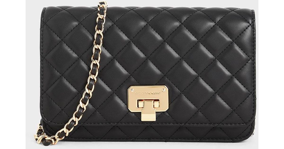 Charles & Keith Quilted Flip-lock Clutch in Black - Lyst