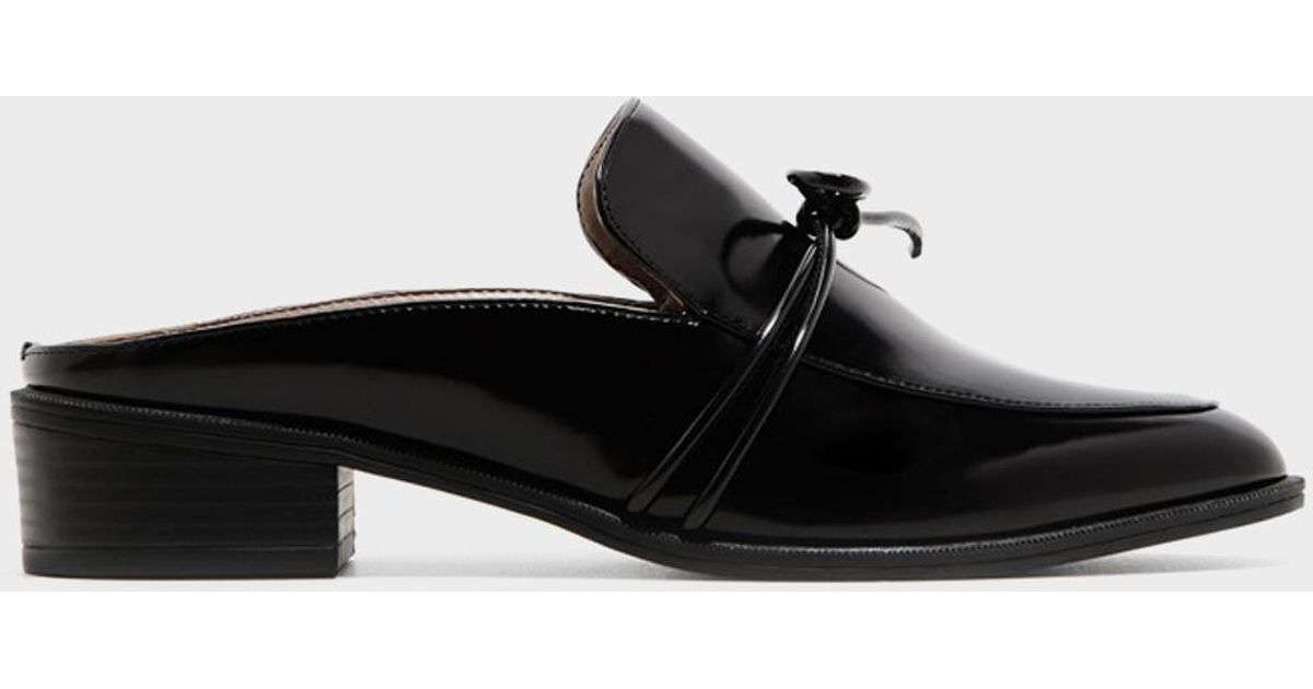 camellia knot mules with ankle strap