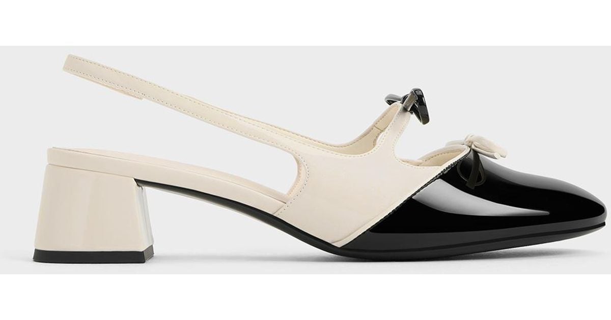Charles & Keith Dorri Two-tone Double-bow Slingback Pumps in