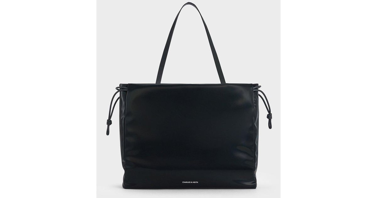 Charles & Keith Bethel Shiny Ruched Drawstring Tote Bag in