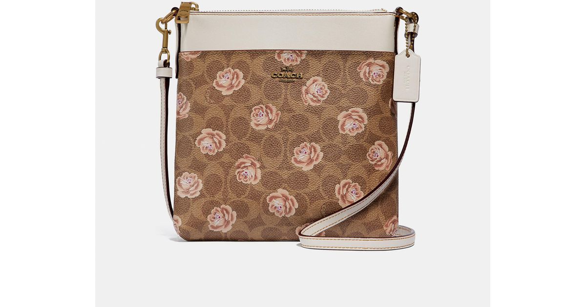 Kitt messenger crossbody cheap in signature rose print