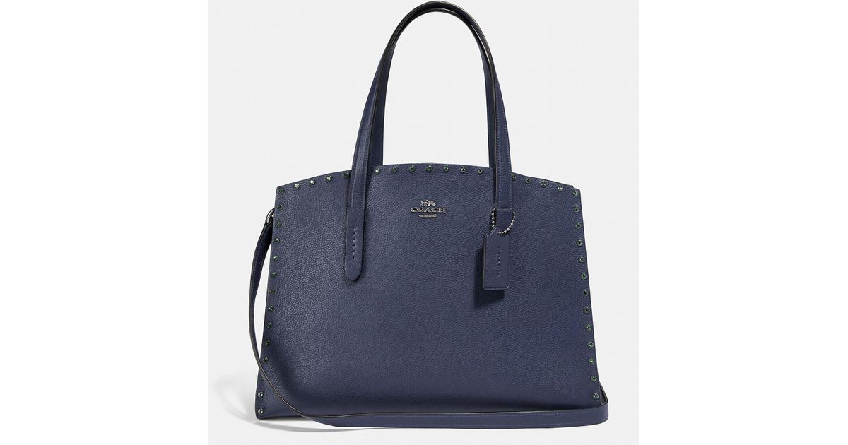 coach charlie carryall metallic