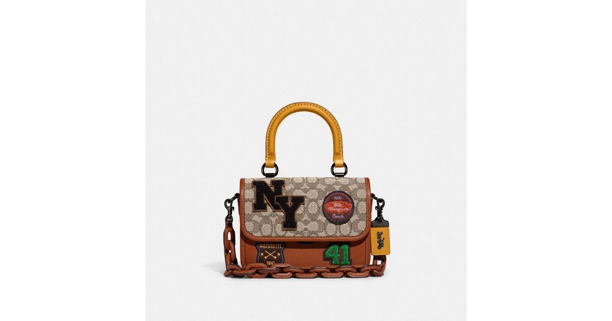 COACH Rogue Top Handle In Signature Textile Jacquard With Varsity Patches  in Brown | Lyst