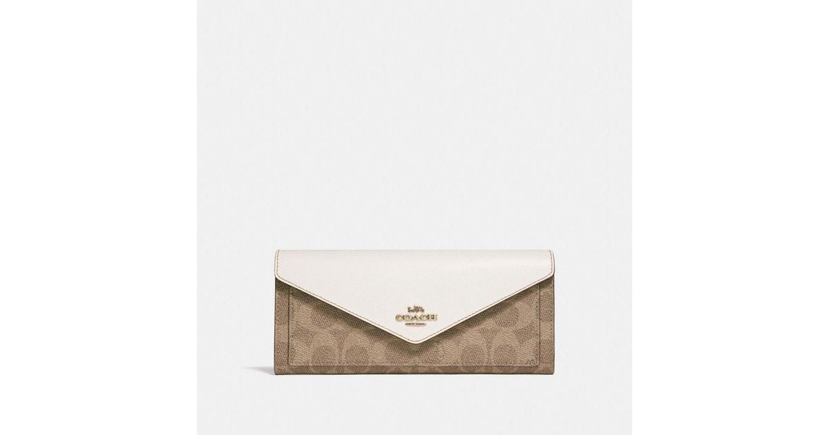 beige coach wallet