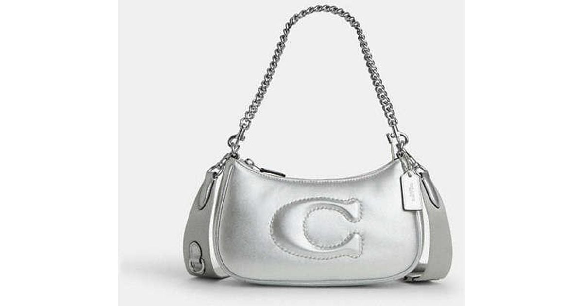 Silver coach handbag clearance
