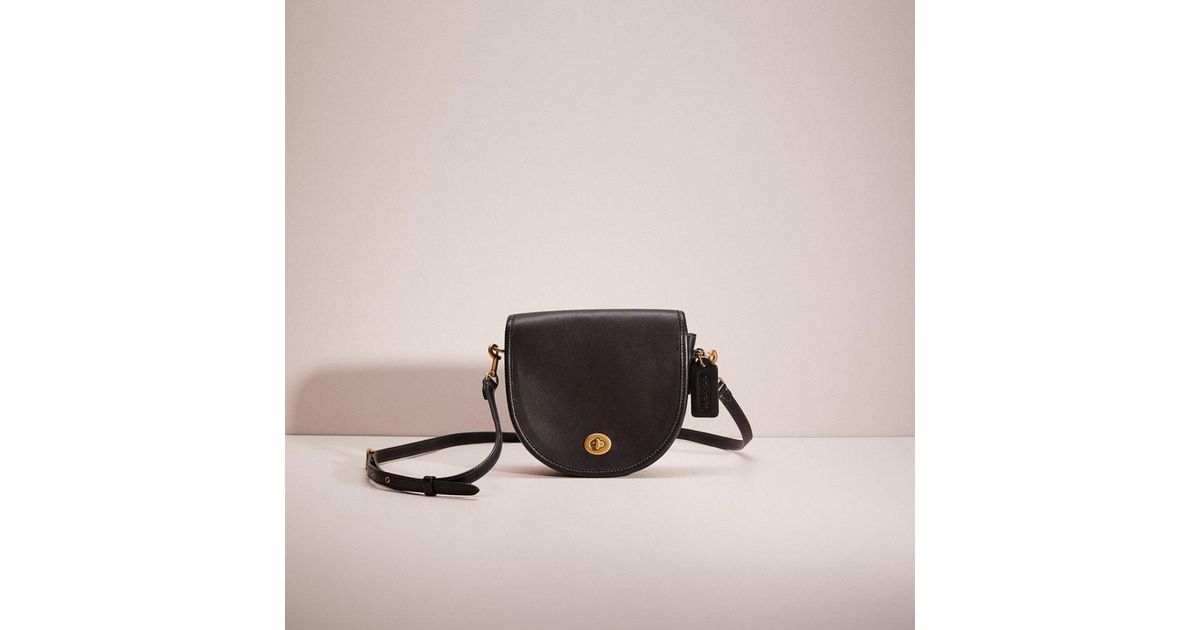 Coach turnlock store saddle bag