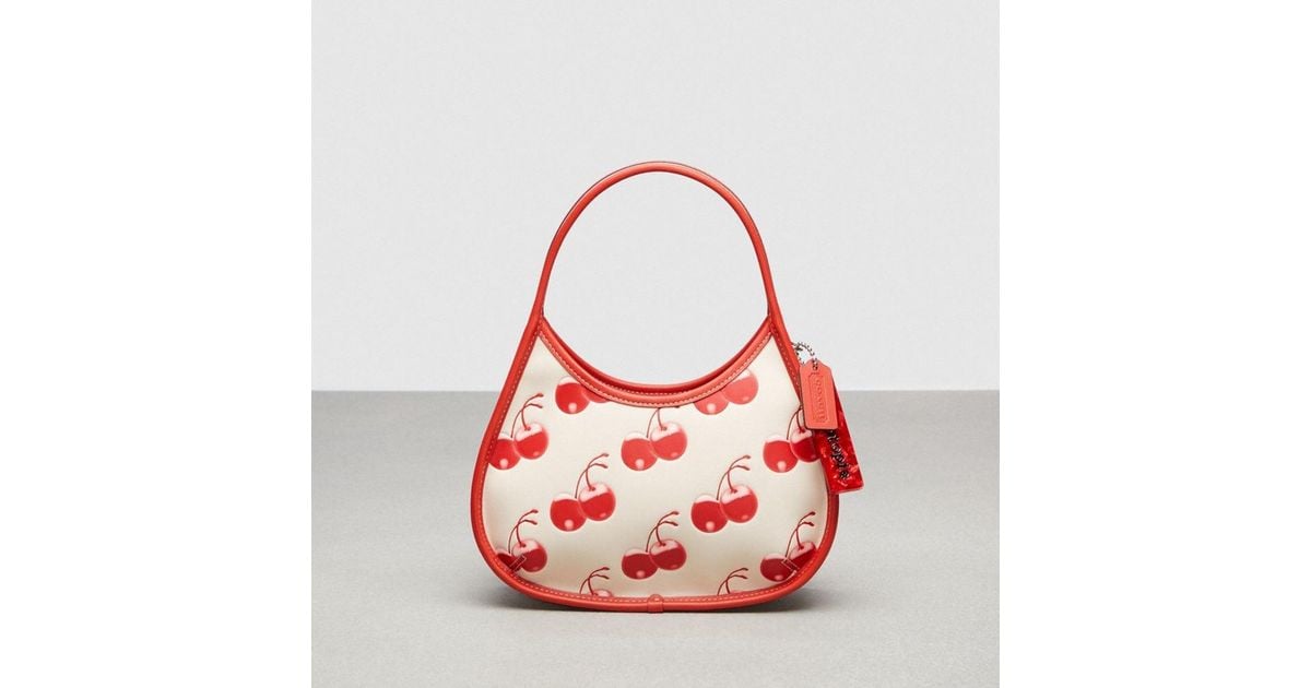 COACH Ergo Shoulder Bag In Topia Leather With Cherry Print in Red Lyst