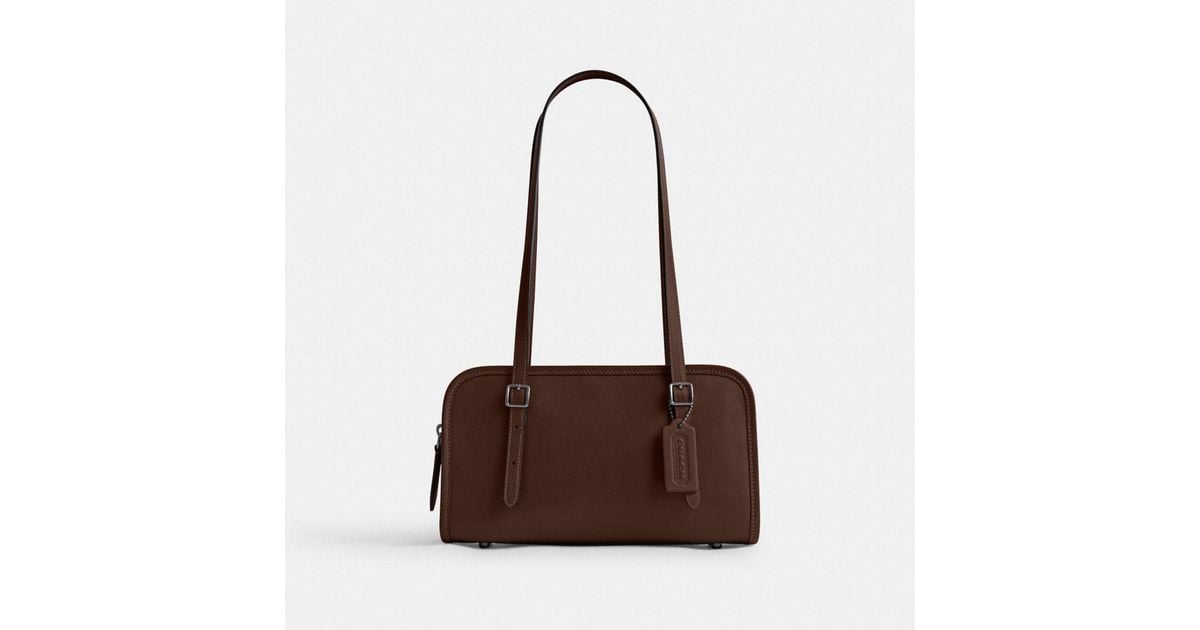 coach-SilverMaple-Swing-Zip.jpeg