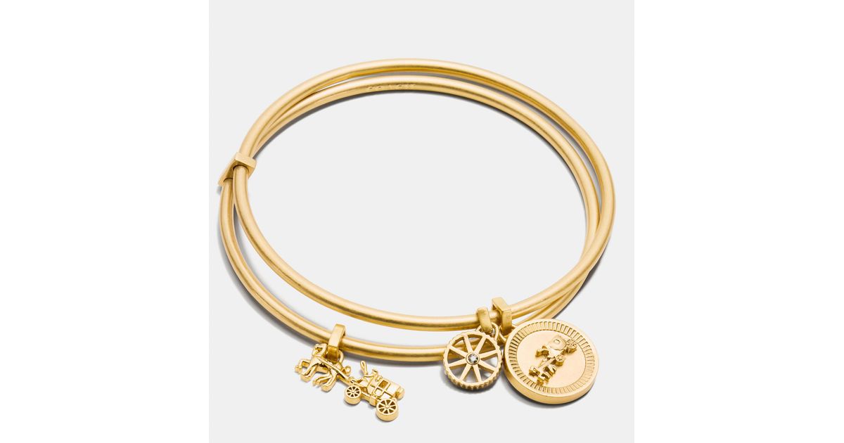 COACH Horse And Carriage Coin Bangle Set in Gold (Metallic) - Lyst