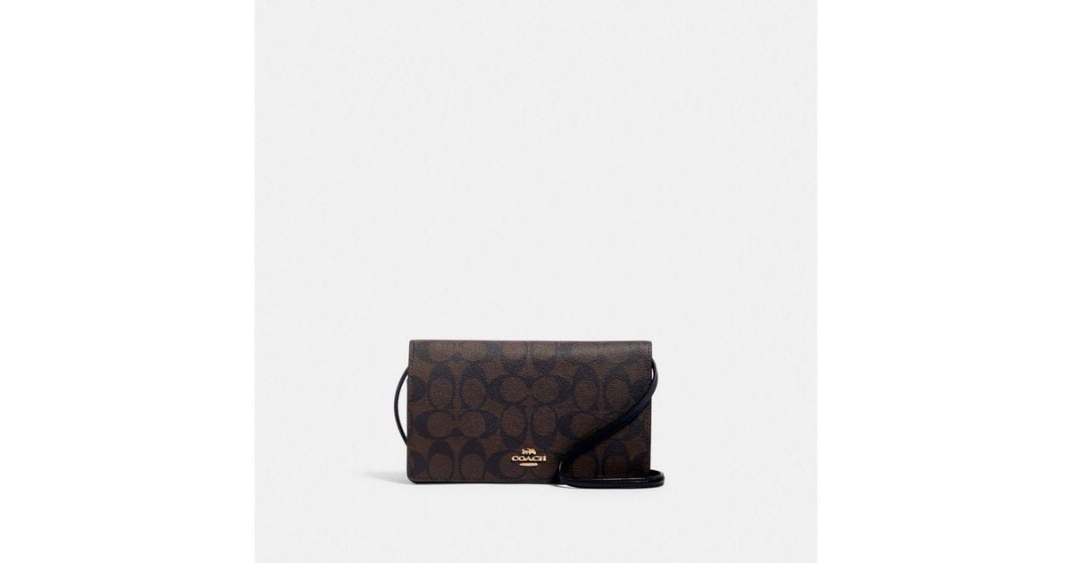  Pochette à bandoulière avec rabat Anna en toile exclusive COACH en coloris Noir Lyst