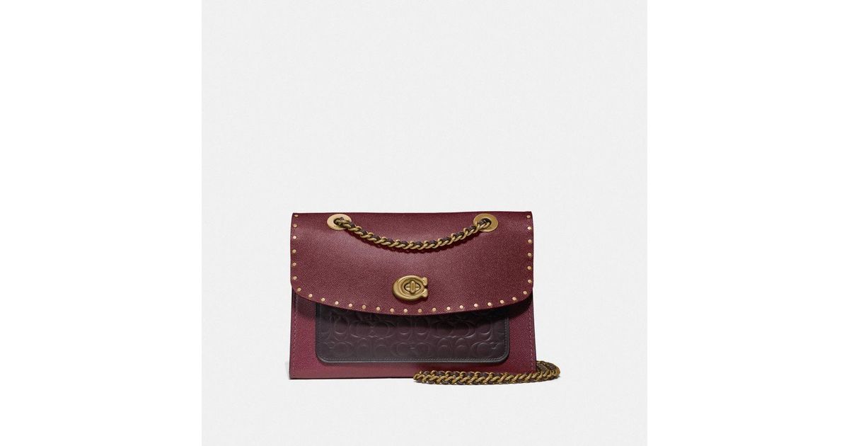 coach parker in signature leather with rivets