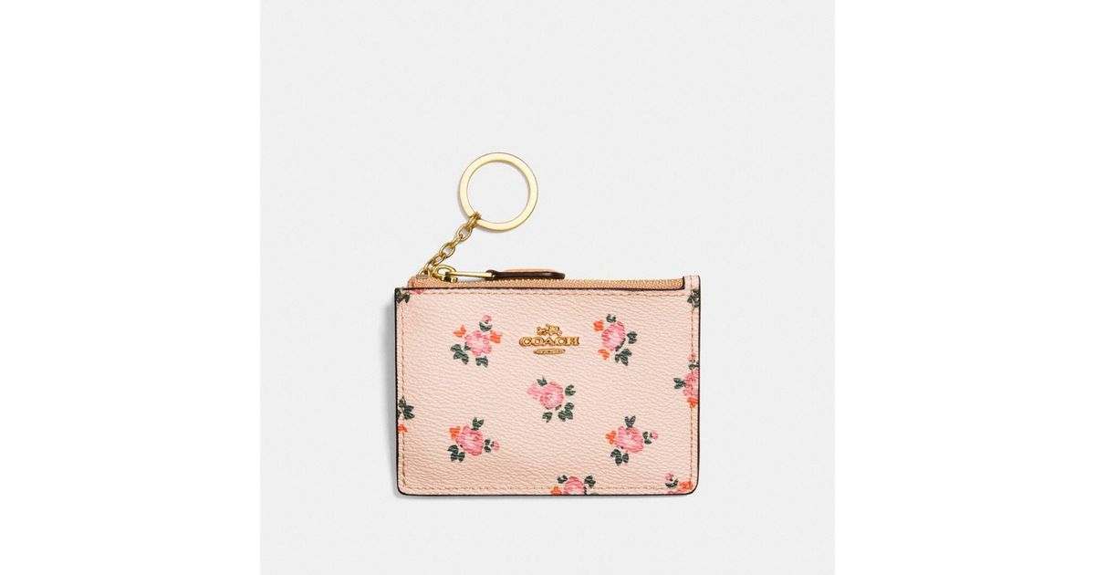 coach floral mini skinny id wallet