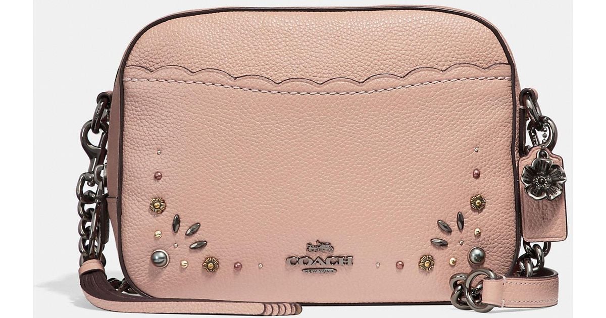coach camera bag with rivets