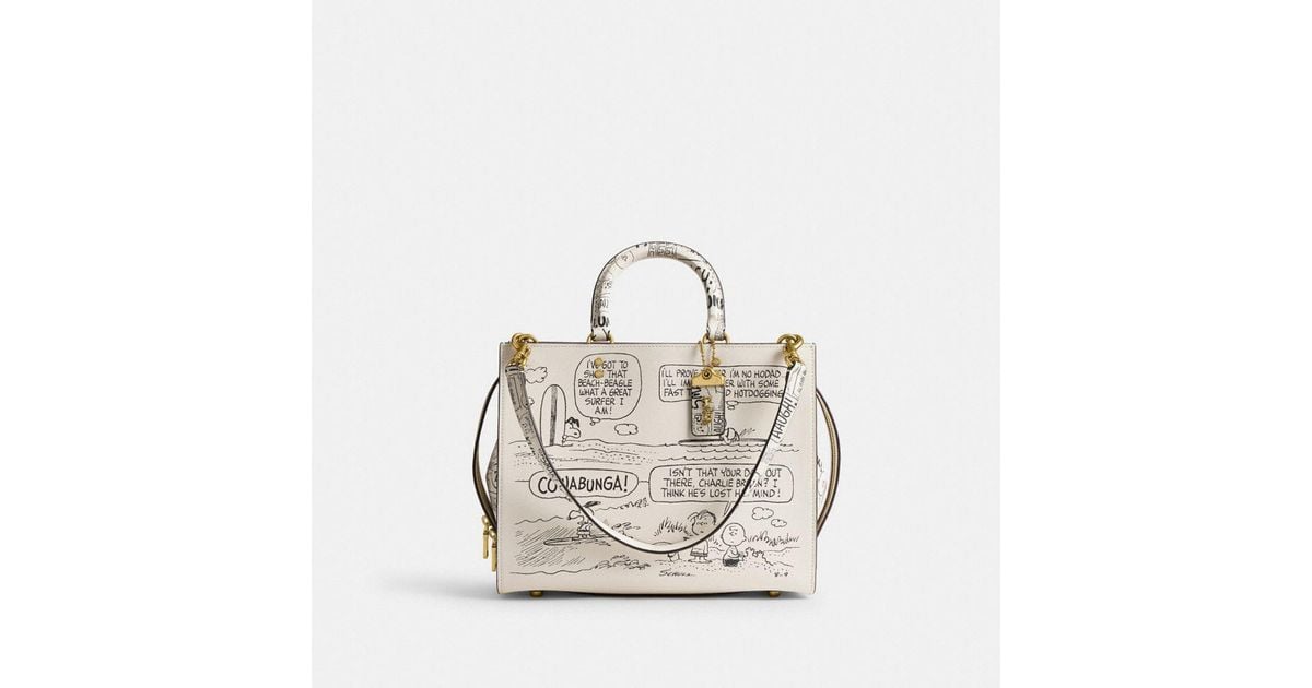 【COACH X PEANUTS】ローグ バッグ・ニュースペーパー プリント COACH X PEANUTS】ローグ バッグ・ニュースペーパー プリント