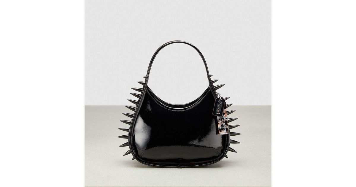 COACH Ergo Bag In Crinkle Patent Topia Leather: Spikes All Over in 