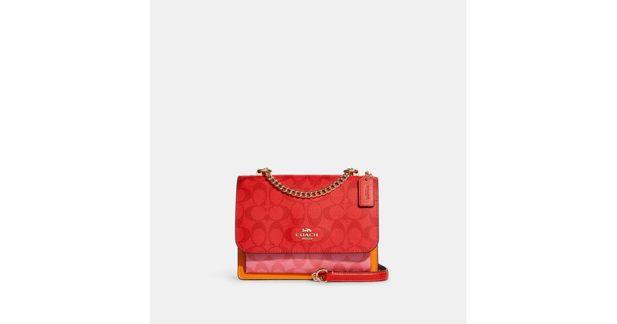 klare crossbody in blocked signature