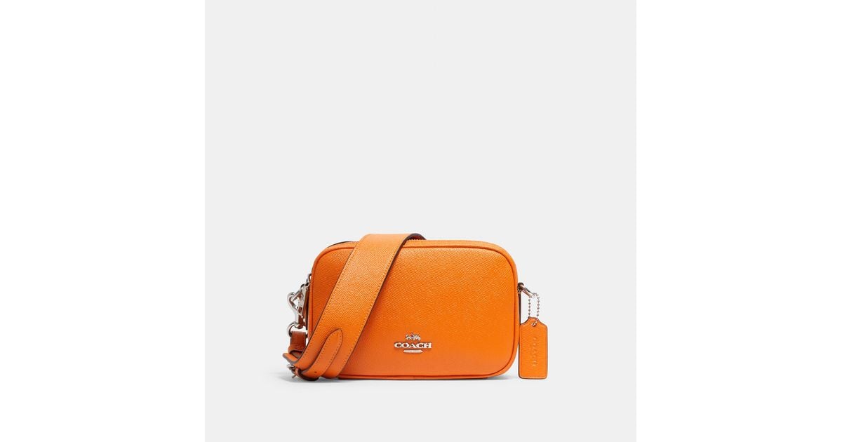 coach tangerine purse