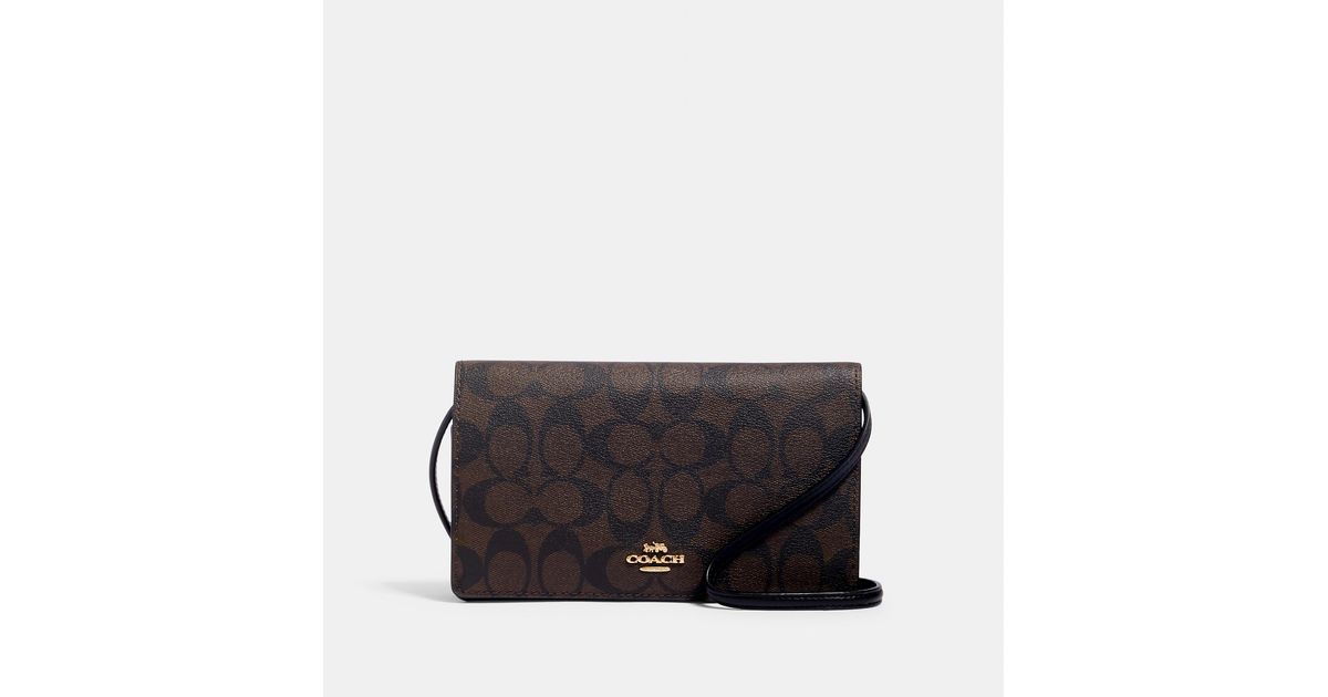 COACH Anna Foldover Crossbody Bag Clutch In Signature Canvas in Black