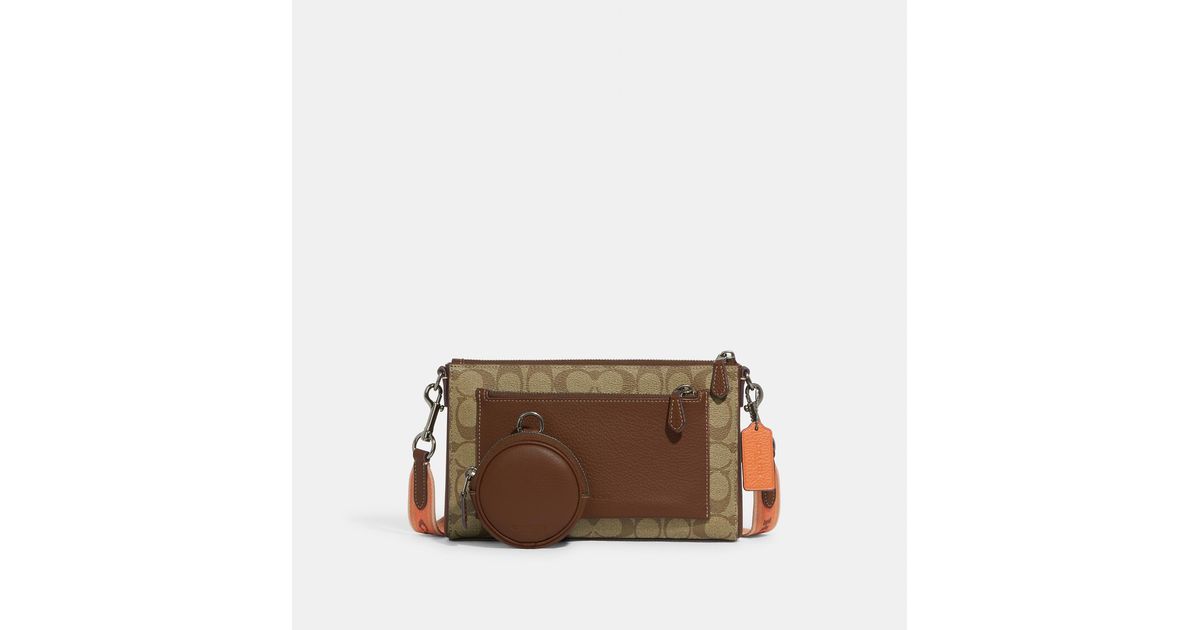 Coach Outlet Holden Crossbody In Colorblock Signature Canvas in Brown ...