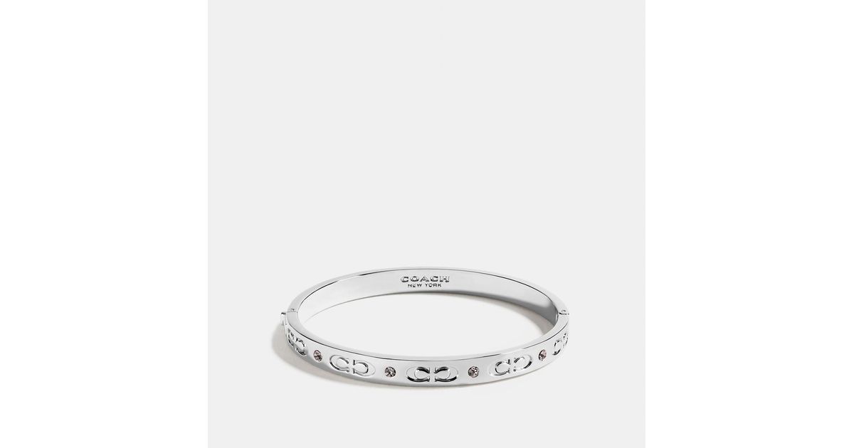 Coach Outlet Kissing C Hinged Bangle Lyst