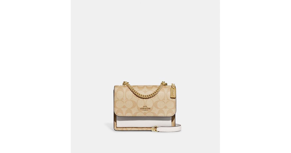 Coach Outlet Mini Klare Crossbody In Signature Canvas in White (Natural