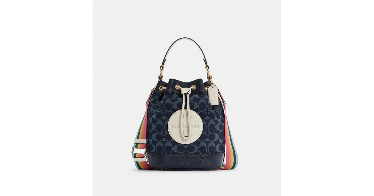 COACH Dempsey Drawstring Bucket Bag In Signature Denim in Blue | Lyst