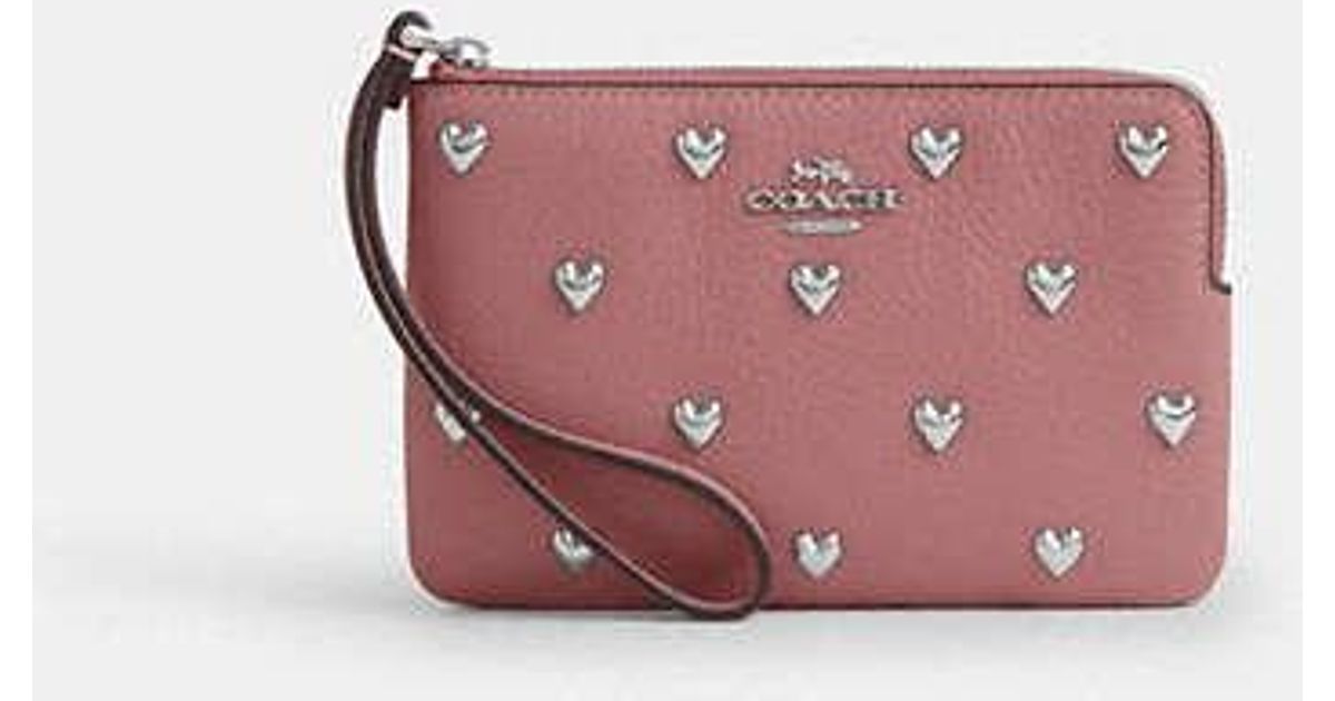 COACH Corner Zip Wristlet With Heart Rivets in Black | Lyst