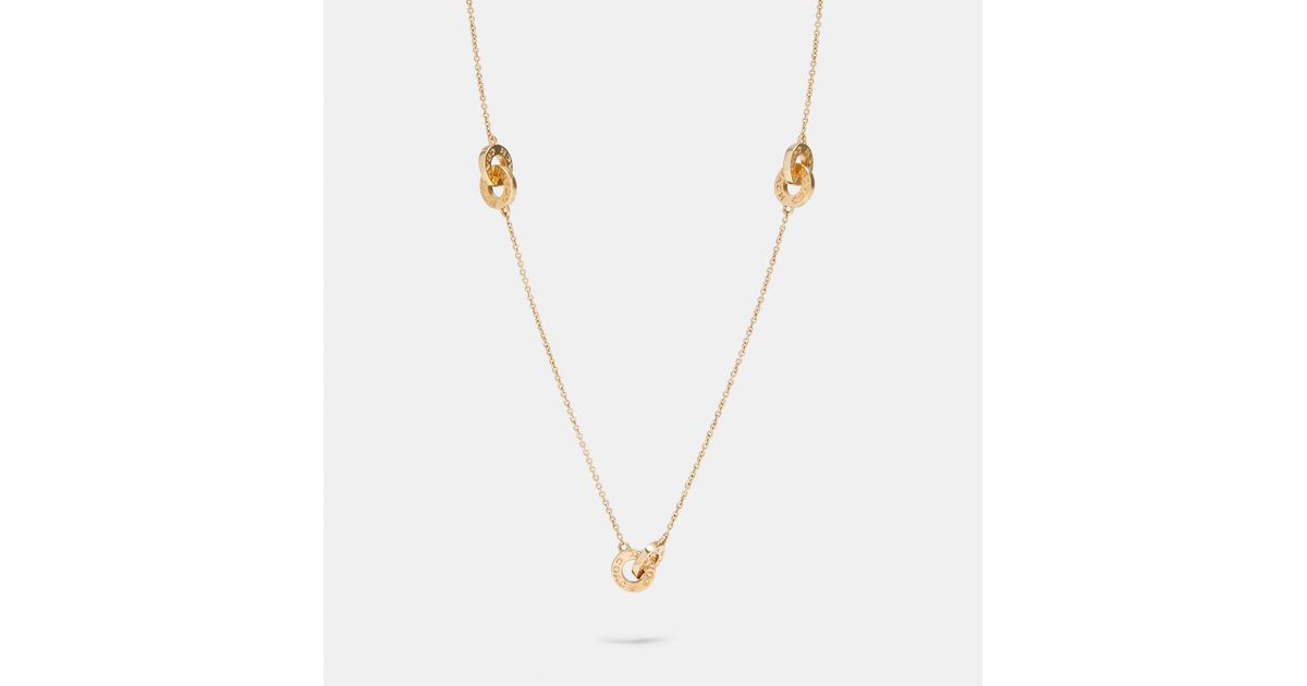 coach interlocking open circle pendant necklace
