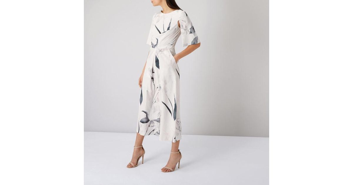 coast savanna cape sleeve jumpsuit