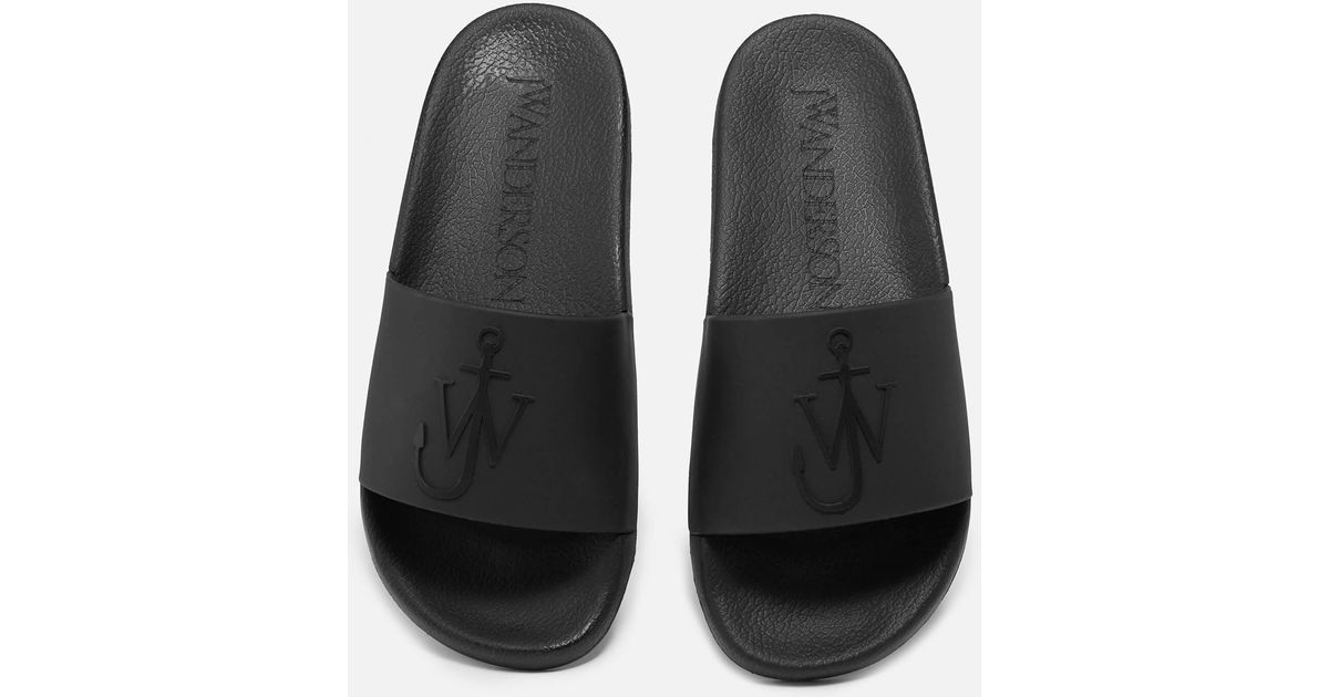 JW Anderson Rubber Logo Pool Slide Sandals in Black | Lyst