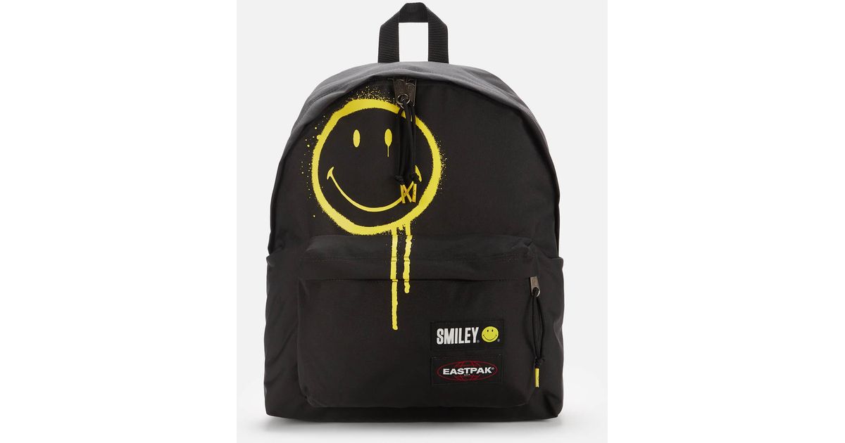 Eastpak Smiley Padded Pak'r Backpack in Black for Men Lyst Canada