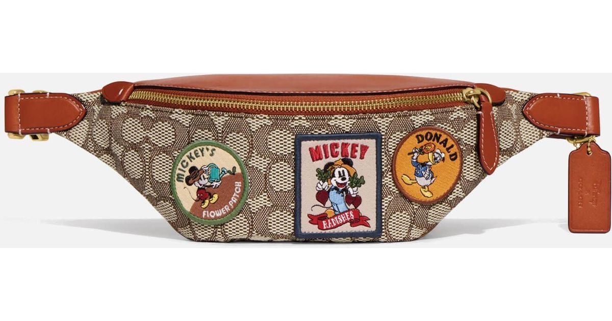 COACH×DISNEY CHARTER BELT BAG 7 IN SIGジップ開閉裏地付き