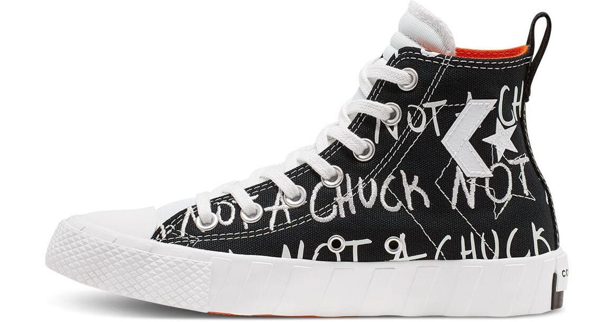 converse noir avec ecriture blanche