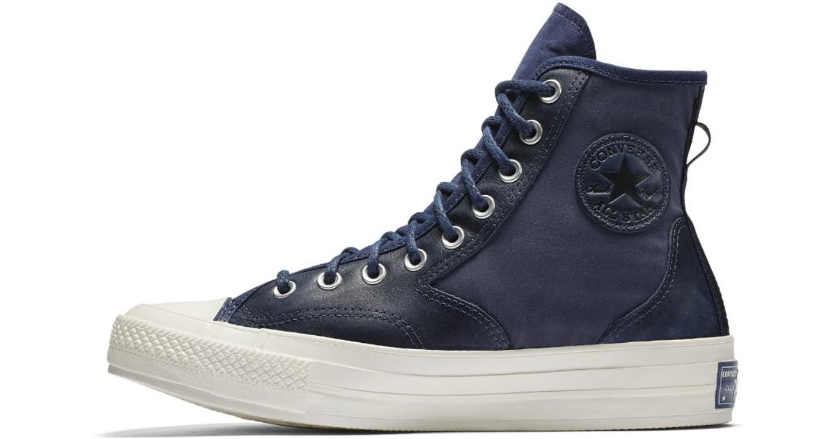 blue leather converse high tops