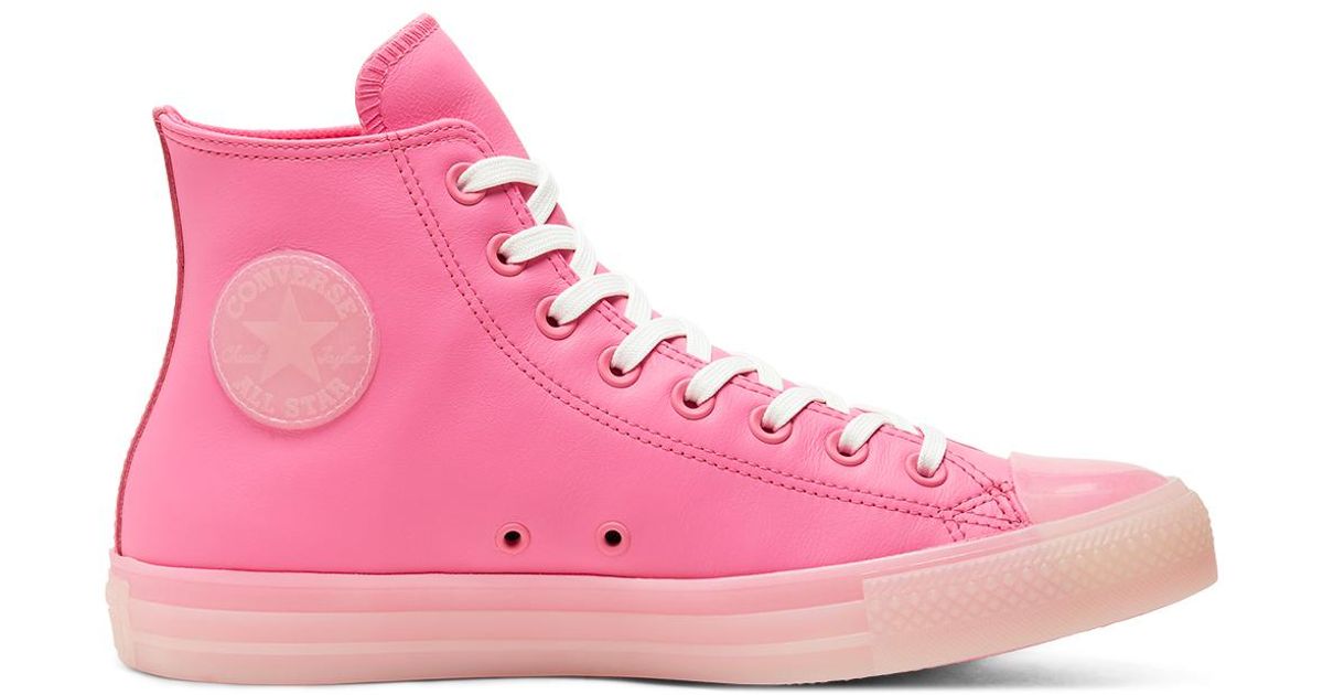 neon pink high top converse