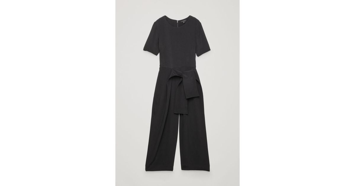 cos black jumpsuit