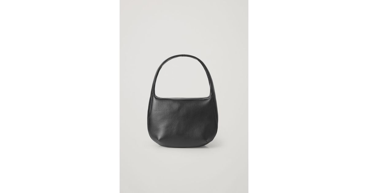 COS Curved Leather Shoulder Bag in Black