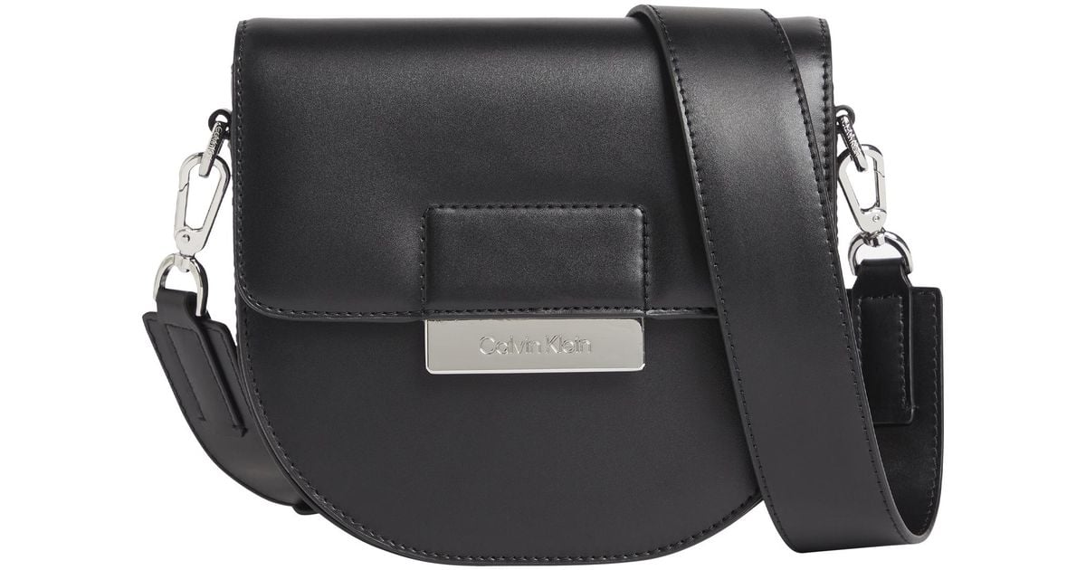 Calvin Klein Ck Core Saddle Bag Sm Handbag in ck Black (Black) | Lyst