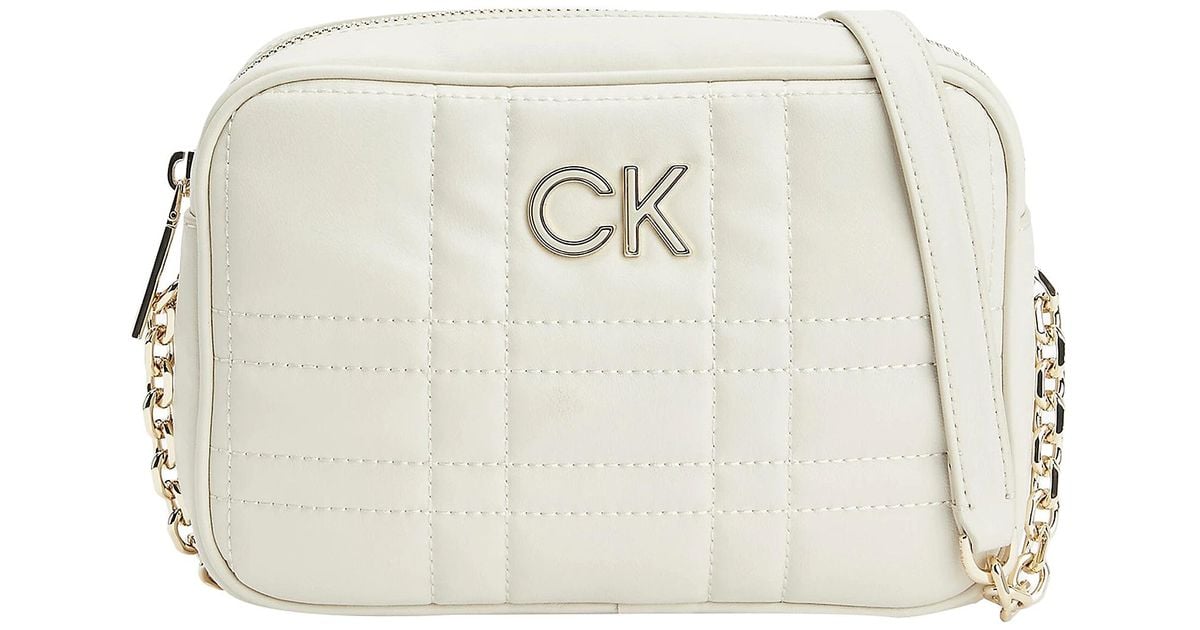 Calvin Klein Re-lock Quilt Camera Handbag in Natural | Lyst