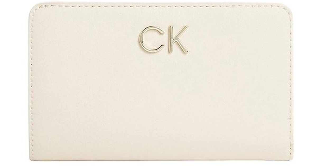 Calvin Klein Denim Wallet With Logo in Beige (Natural) | Lyst