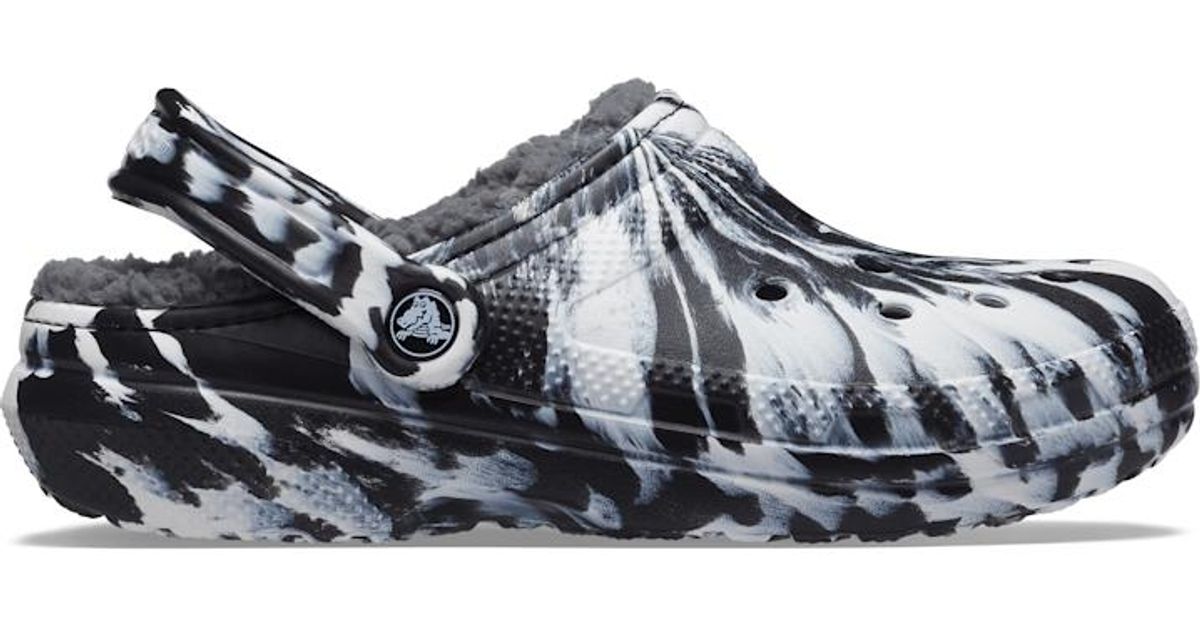 black crocs with white fur