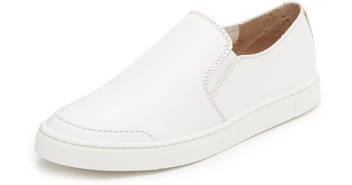 white leather slip on trainers womens